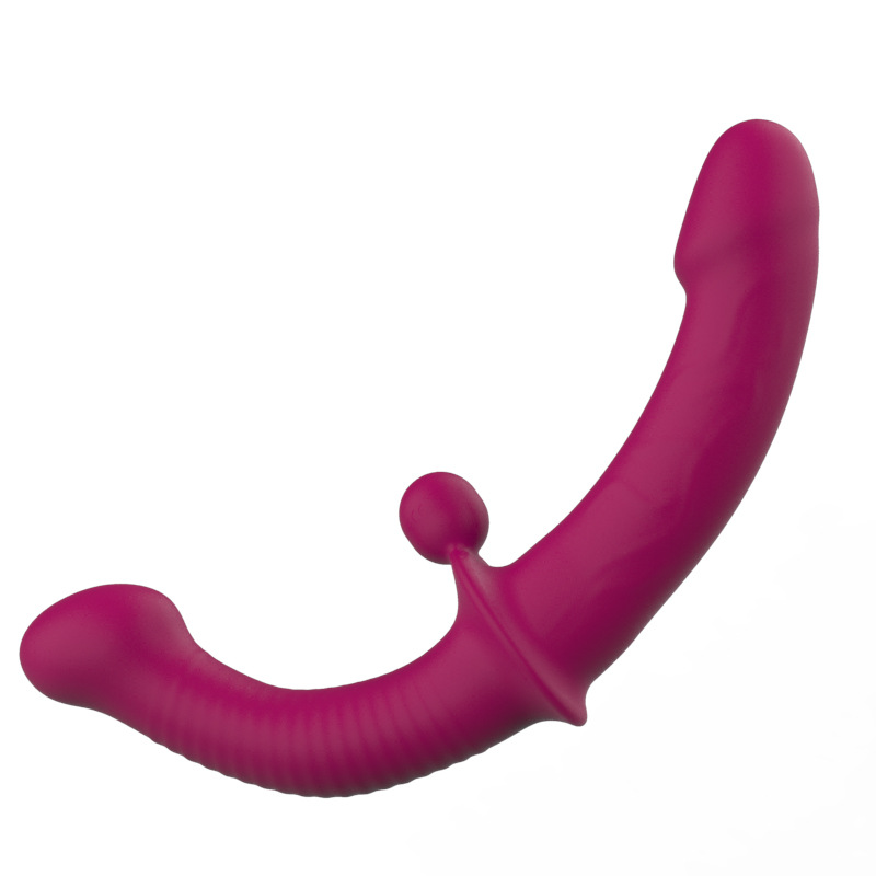 Berry curved dual-ended vibrator with smooth shaft and textured tail