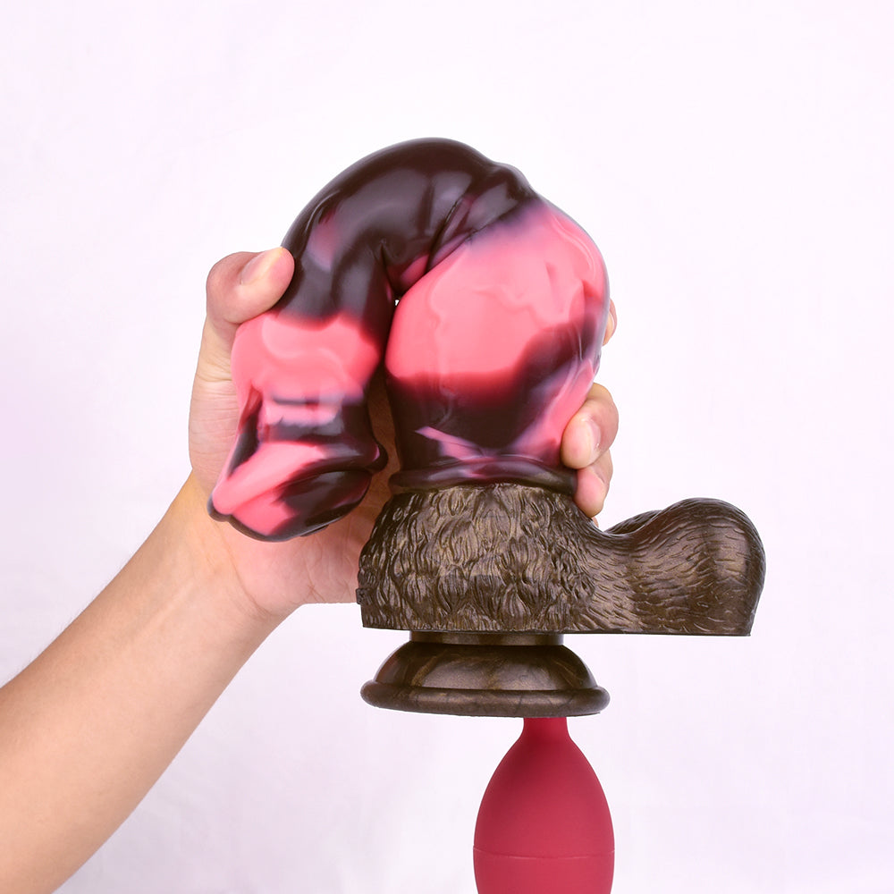 N5092 marbled silicone squirting dildo shown bent by hand to demonstrate flexibility and scale