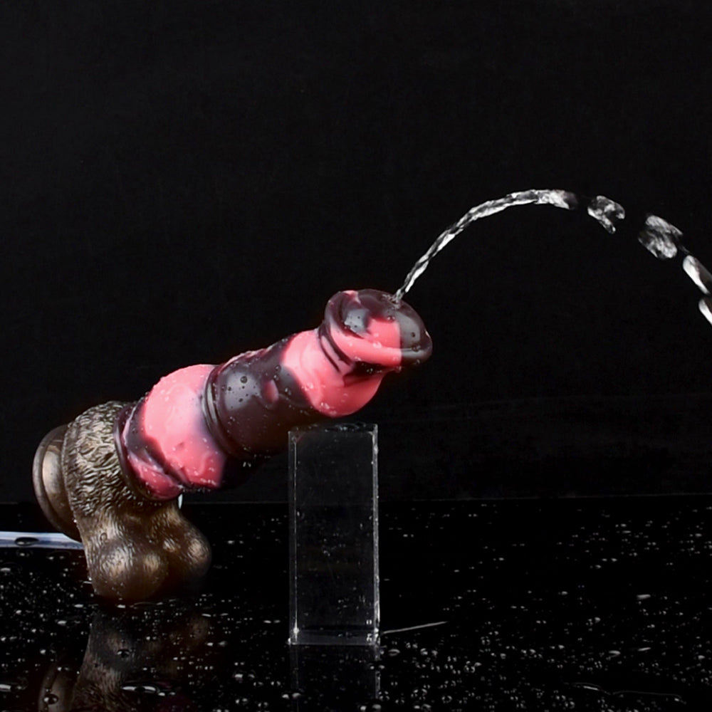 N5092 marbled silicone squirting dildo demonstrating manual liquid release from the tip