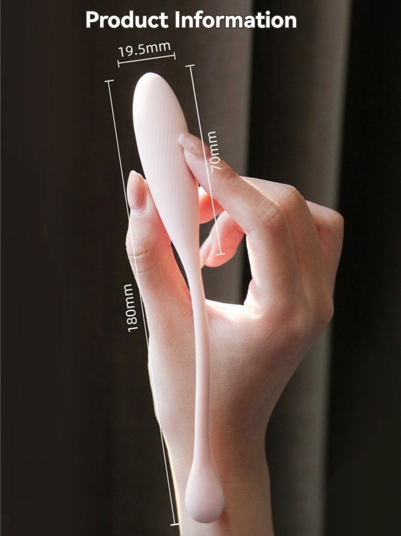 Pink mini vibrator held in hand with product dimensions.
