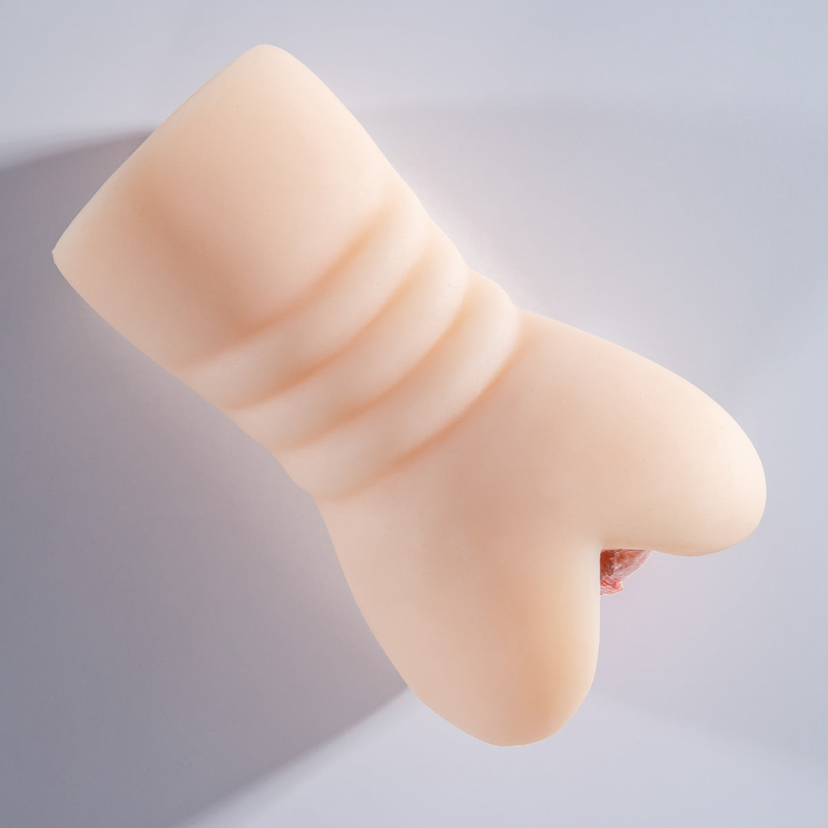 Realistic TPE male masturbator base angle view
