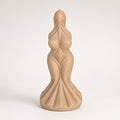 Skin Tone sculpted goddess-form curved silicone dildo on a clean light background