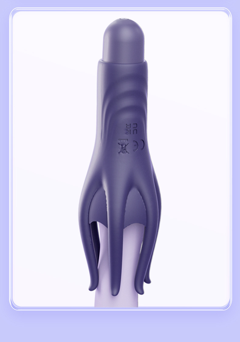 Six-finger vibrating penis massager shown on a finger for scale and handling