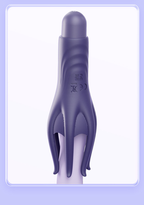 Six-finger vibrating penis massager shown on a finger for scale and handling
